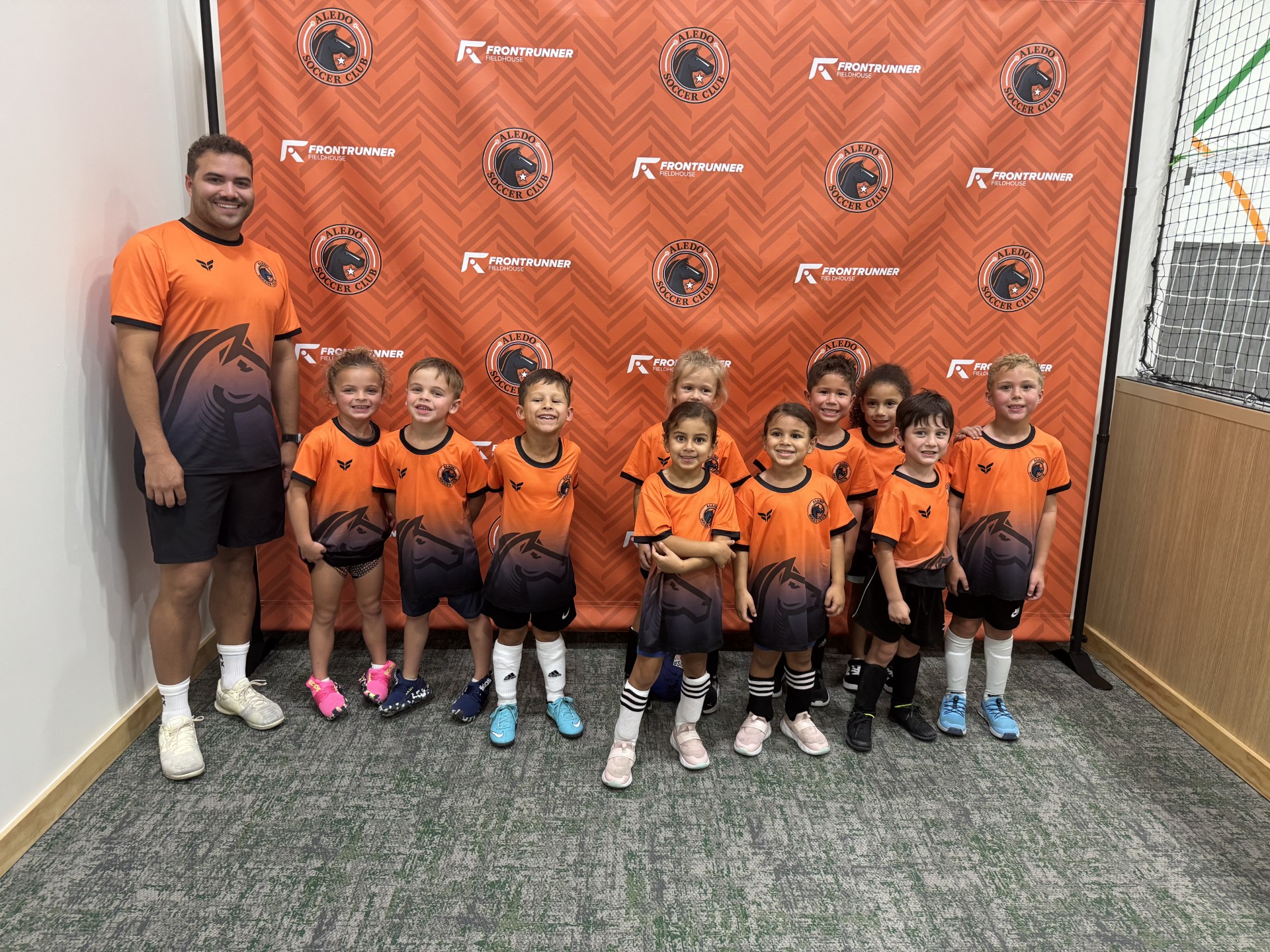 Little Aledo U6 players having fun