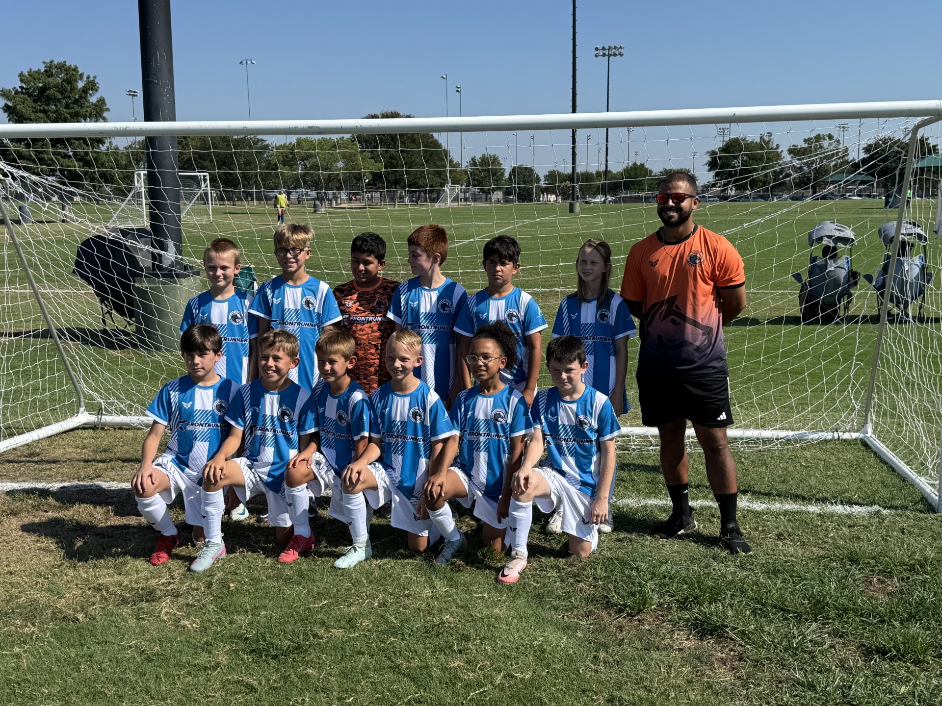 Coach Ruben with Team at API League